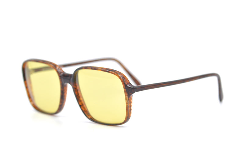 Luxottica 500 Vintage Sunglasses. The Serpent Sunglasses Netflix Sunglasses. 70s Style Sunglasses. Yellow tinted sunglasses.