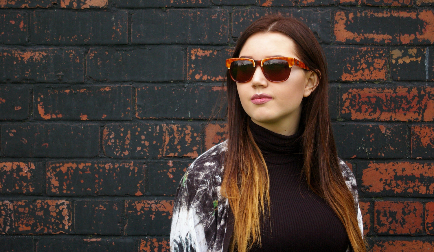 Assorted vintage sunglasses including cat-eye, aviator and round designs.