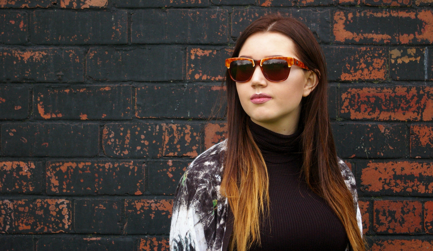 Assorted vintage sunglasses including cat-eye, aviator and round designs.