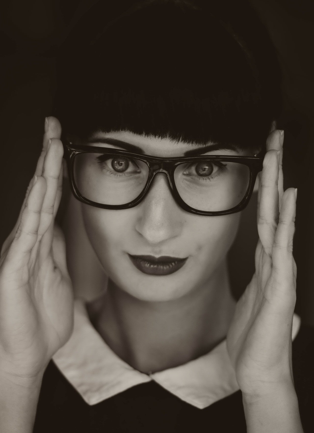 A bold pair of authentic vintage acetate glasses (think 70s or 80s influence — sculpted, characterful, not trendy-fast-fashion).