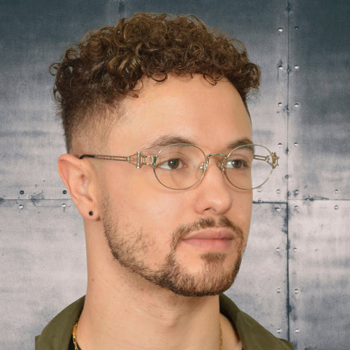 A collection of 1990s Jean Paul Gaultier vintage glasses and sunglasses featuring steampunk metal details, handcrafted in Japan by Murai.