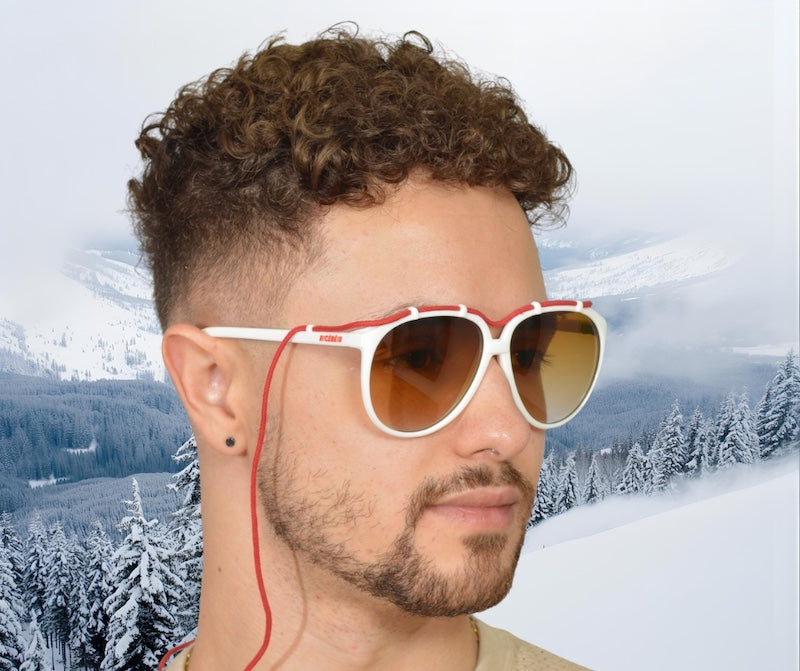 Cébé 1912 white vintage skiing sunglasses with red cord detail. 