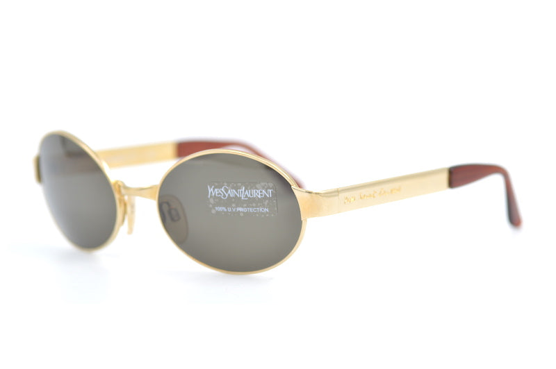 YSL 6068 vintage sunglasses. Oval YSL sunglasses. Unisex YSL sunglasses. Saint Laurent sunglasses. Gold oval sunglasses. Unisex designer sunglasses. Vintage designer sunglasses. Vintage YSL. 90s Sunglasses.