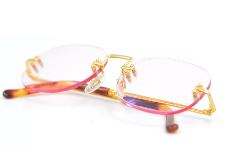Enrique Loewe Knappe Afrodita Pink Lens Sunglasses. Sunglasses with Pink Lenses. Luxury vintage sunglasses. Designer Sunglasses Gold and platinum plated sunglasses . 
