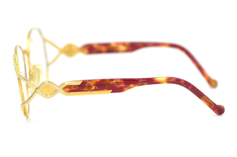 Enrique Loewe Knappe Gaia vintage glasses. 22Kt gold and platinum plated glasses. Rare vintage glasses. Luxury vintage glasses. Gold plated Glasses. Luxury vintage eyewear. Luxury eyewear. Unique Glasses.