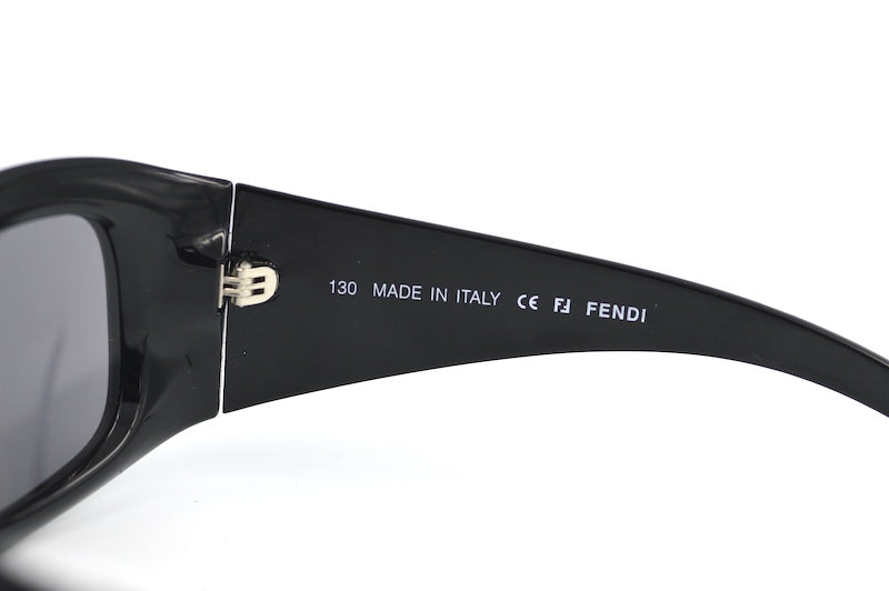 Fendi 299RI women's vintage sunglasses. Limited edition Fendi sunglasses. Black wrap around vintage sunglasses.
