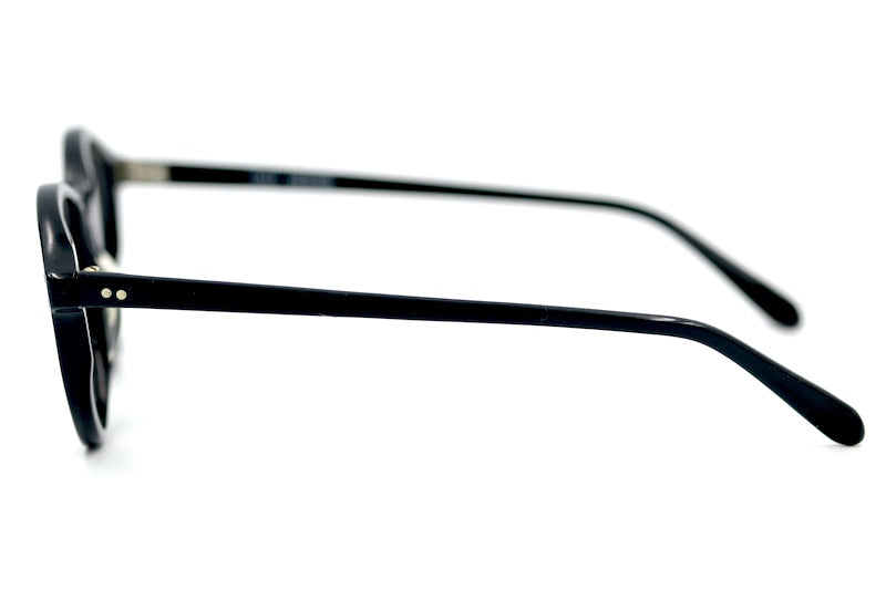 M.S. & F. 40s style round black glasses with rivet detail. 