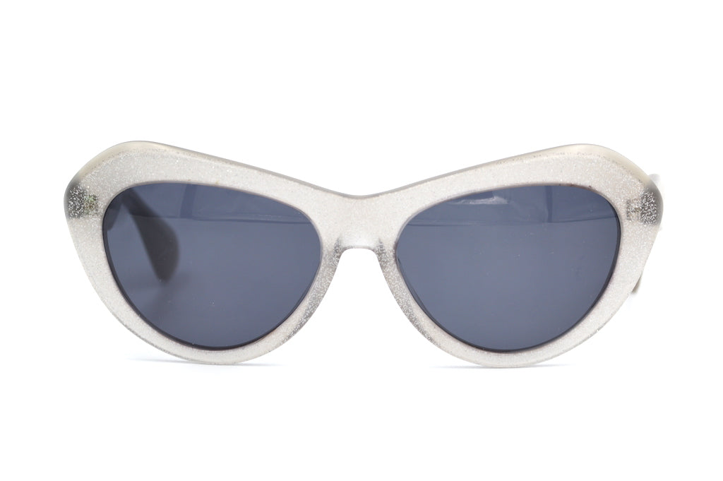 Miu Miu SMU01N sunglasses. Miu Miu cat eye sunglasses. Miu Miu sunglasses. Sustainable sunglasses.
