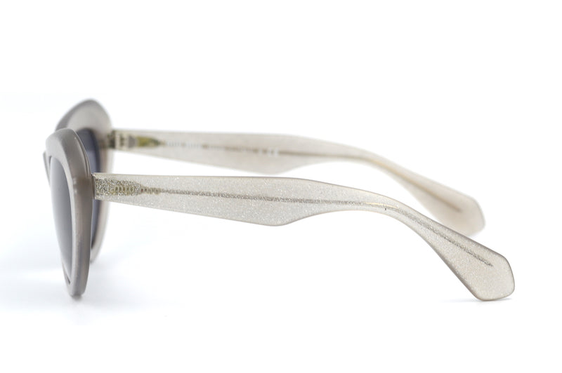 Miu Miu SMU01N sunglasses. Miu Miu cat eye sunglasses. Miu Miu sunglasses. Sustainable sunglasses.