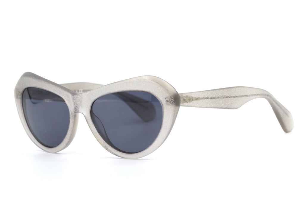 Miu Miu SMU01N sunglasses. Miu Miu cat eye sunglasses. Miu Miu sunglasses. Sustainable sunglasses.