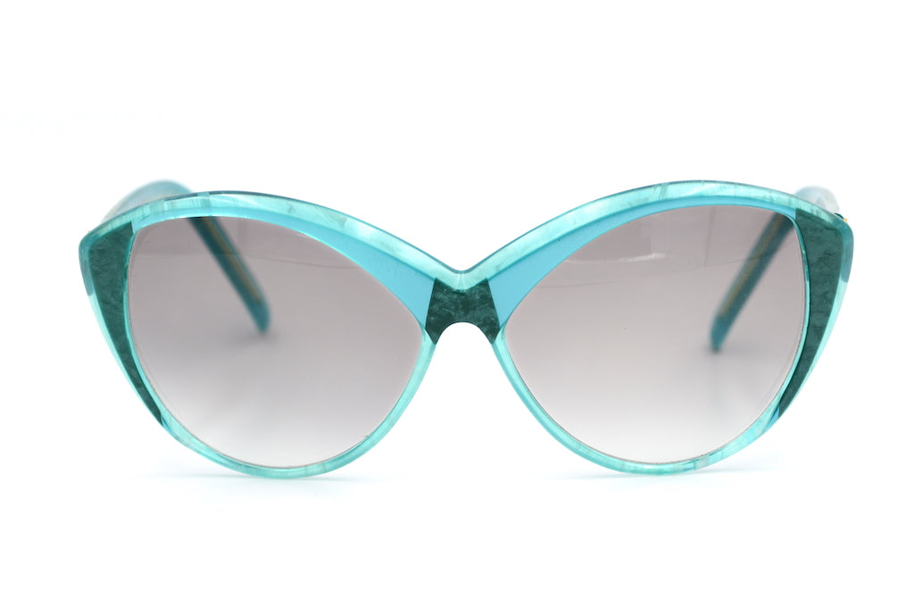 Yves Saint Laurent 8702 vintage sunglasses. YSL Sunglasses. Vintage YSL. Turquoise sunglasses. 1980's vintage sunglasses. Sustainable sunglasses. Vintage designer sunglasses.