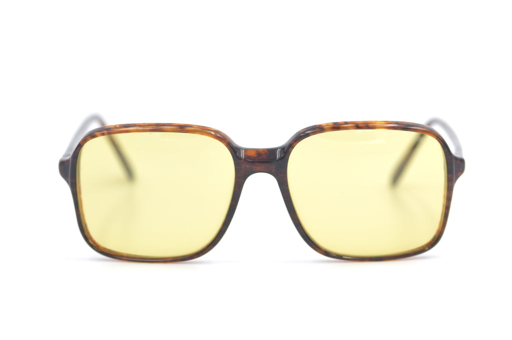 Luxottica 500 Vintage Sunglasses. The Serpent Sunglasses Netflix Sunglasses. 70s Style Sunglasses. Yellow tinted sunglasses.