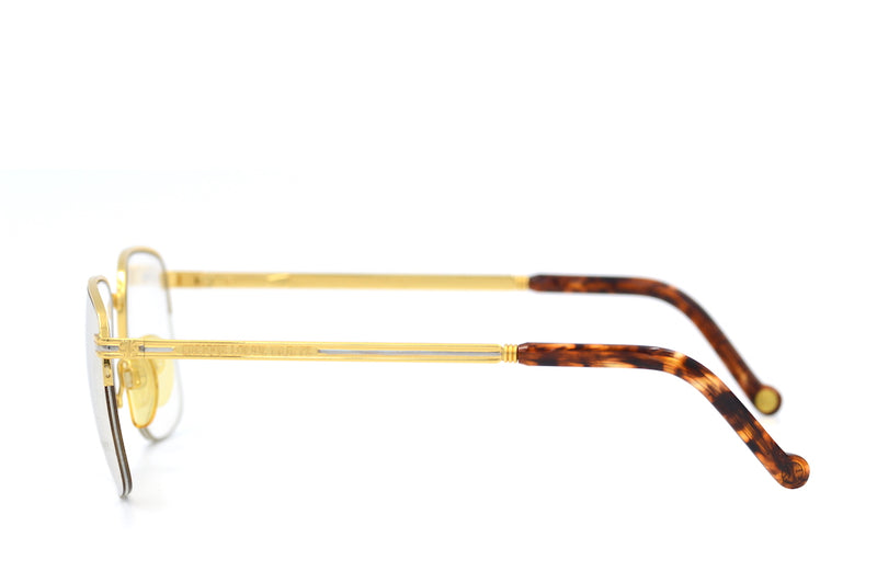 Enrique Loewe Knappe Helios vintage glasses. 22Kt gold and platinum plated glasses. Rare vintage glasses. Luxury vintage glasses. Gold plated Glasses. Luxury vintage eyewear. Luxury eyewear. Unique Glasses.