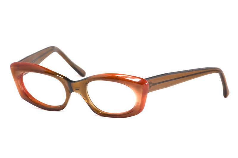 Front/side view of ladies 1970's amber upswept frame