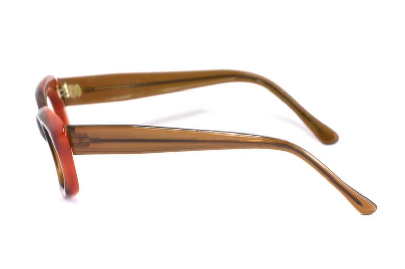 Side view of ladies 1970's amber upswept frame